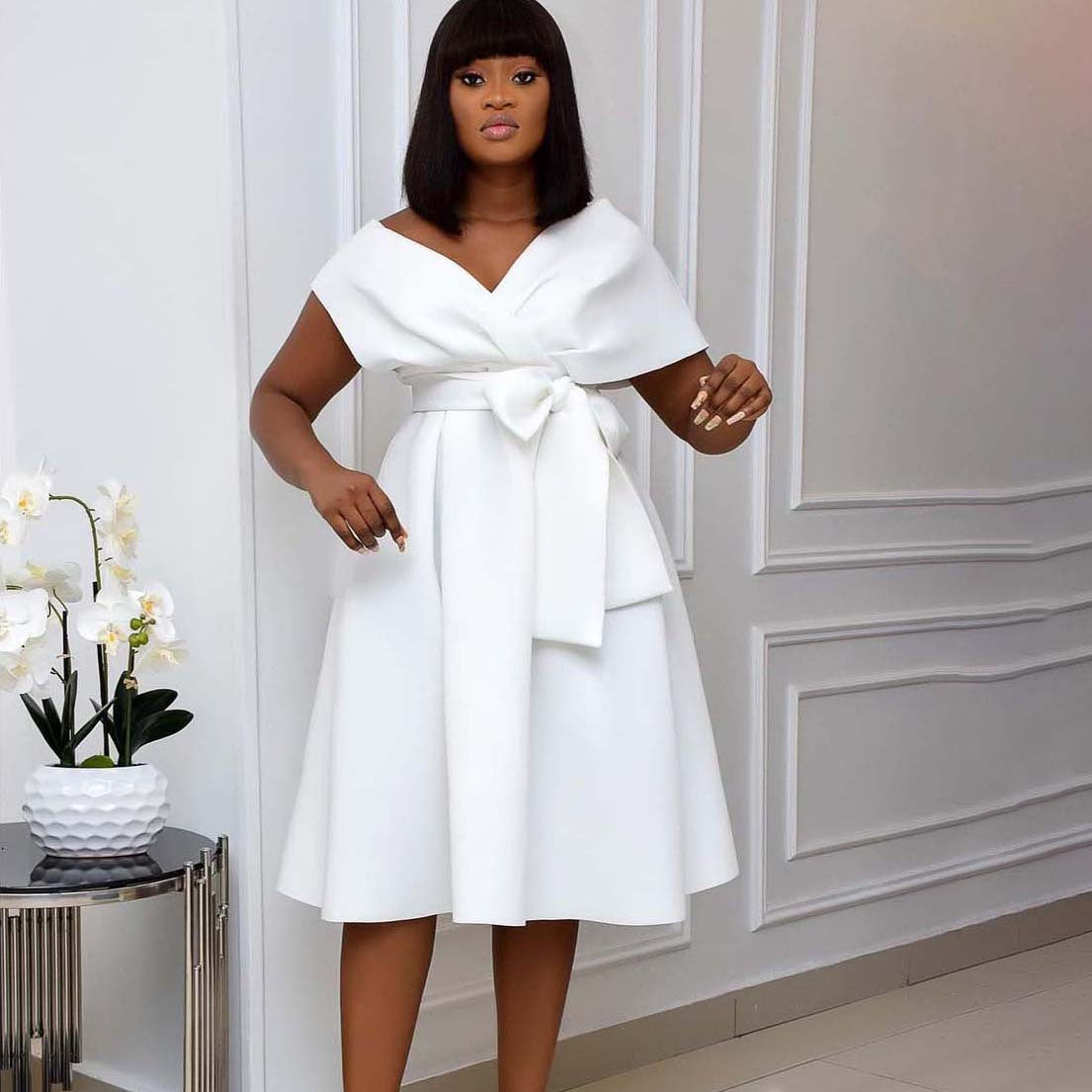 Robe portefeuille pour femmes avec coupe fluide et poches pratiques Chic und Stil