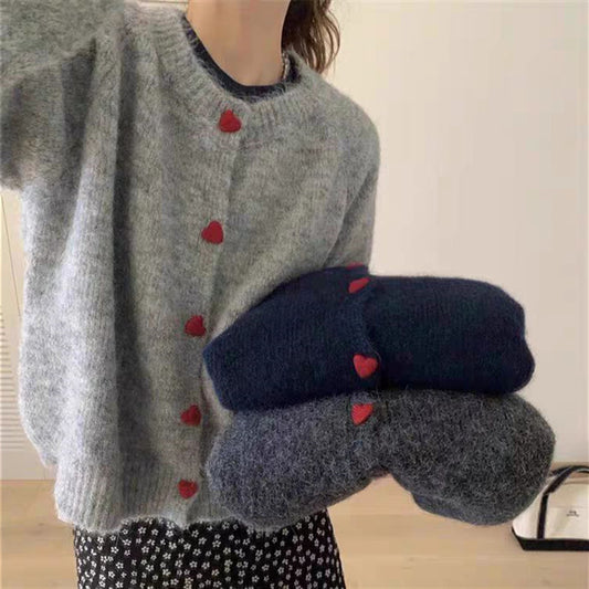 Dames pull-over tricot doux avec boutons en forme de cœur Chic und Stil