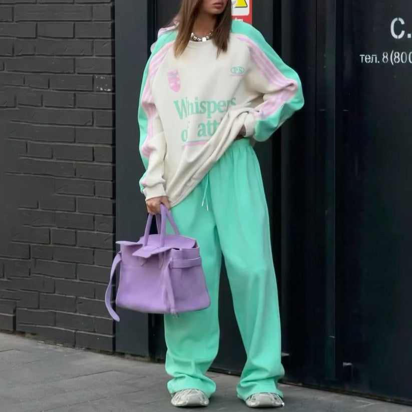 Ladies Casual Sports Outfit with a Relaxed Sweatshirt and Comfortable Jogging Pants Chic and Style