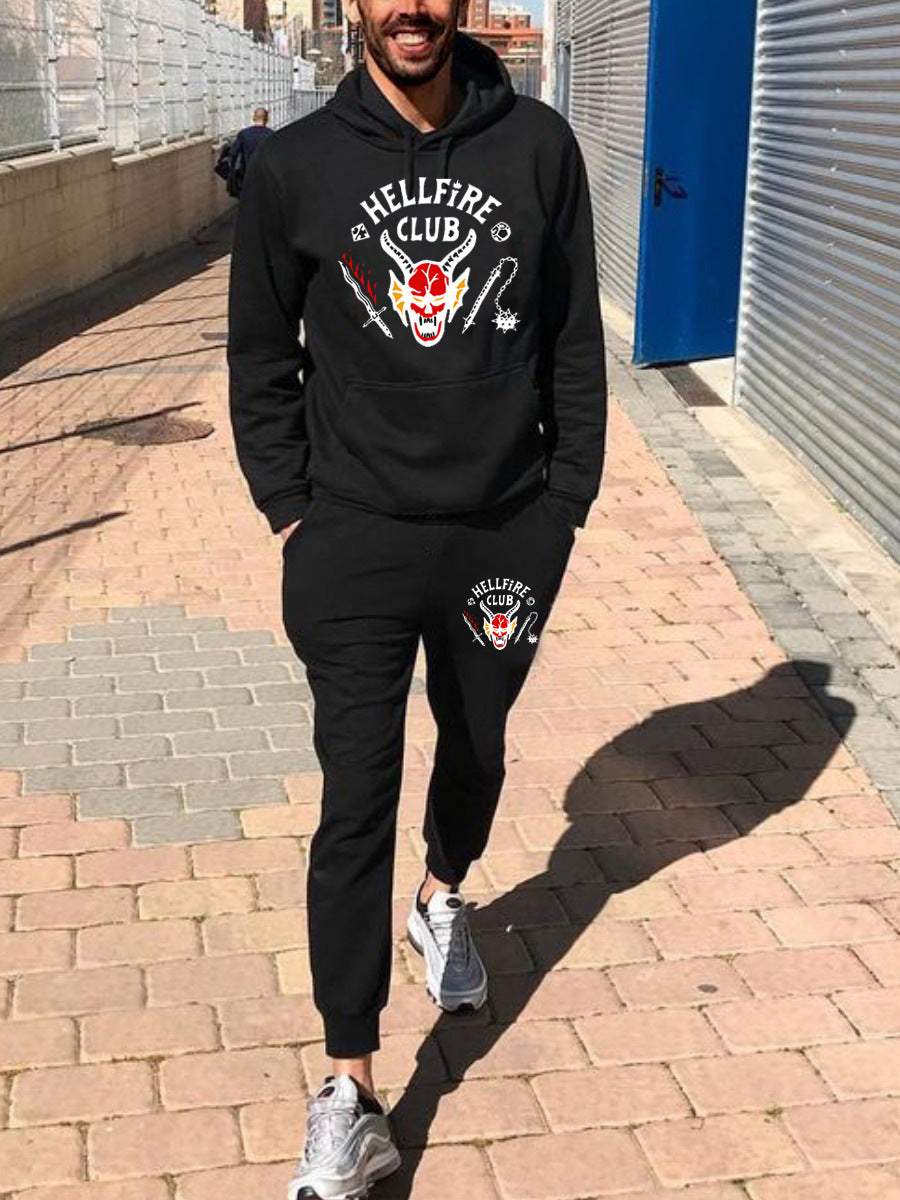 Comfortable men's set with hooded sweatshirt and jogger pants, striking graphic design Chic und Stil