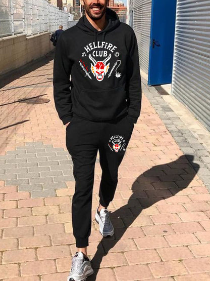 Comfortable men's set with hooded sweatshirt and jogger pants, striking graphic design Chic und Stil