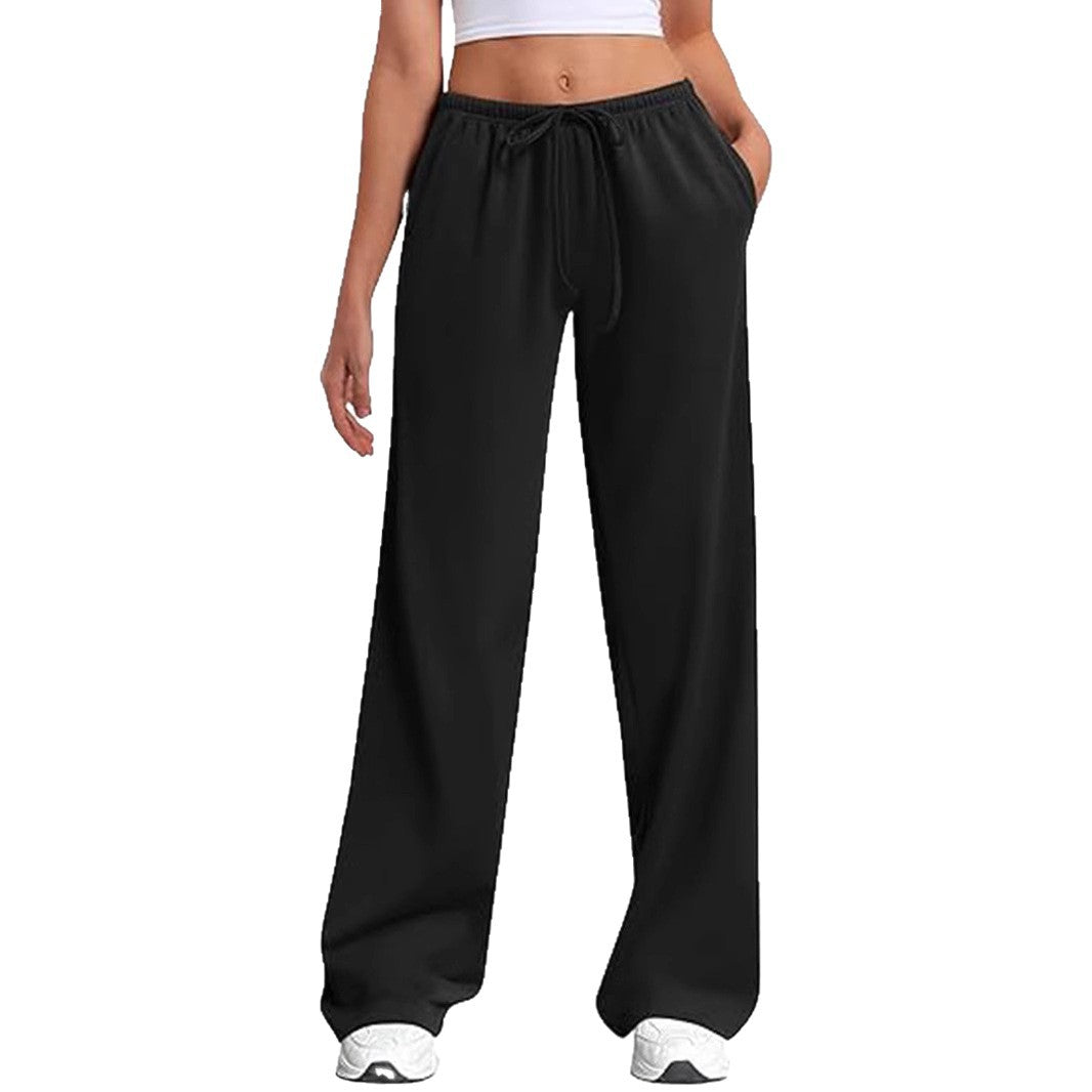 Loose sports pants for women with elastic waistband and side pockets Chic und Stil