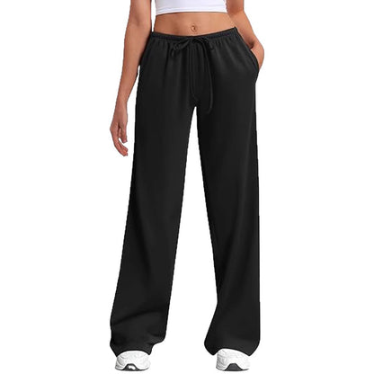 Loose sports pants for women with elastic waistband and side pockets Chic und Stil