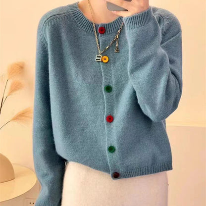 Women's playful knit vest with colorful button details Chic and Stil