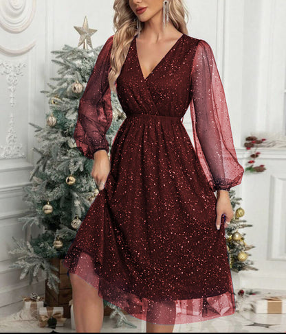 Robe midi glamour pour femmes avec des manches bouffantes transparentes et un motif de sequins scintillants Chic und Stil