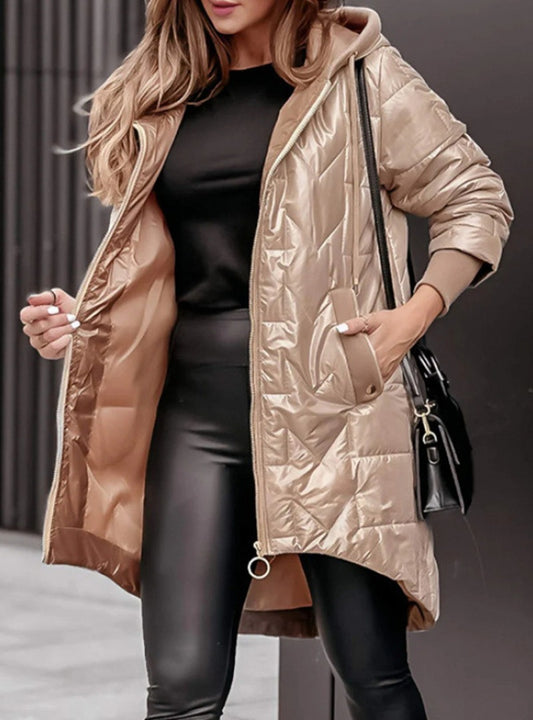 Quilted hooded jacket for women with asymmetric cut and practical pockets Chic and Style