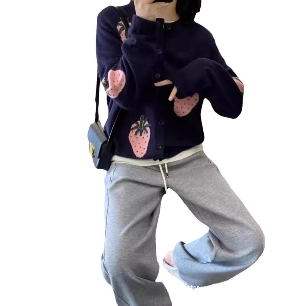 Dames Cardigan à motifs ludiques avec détail bouton Chic und Stil