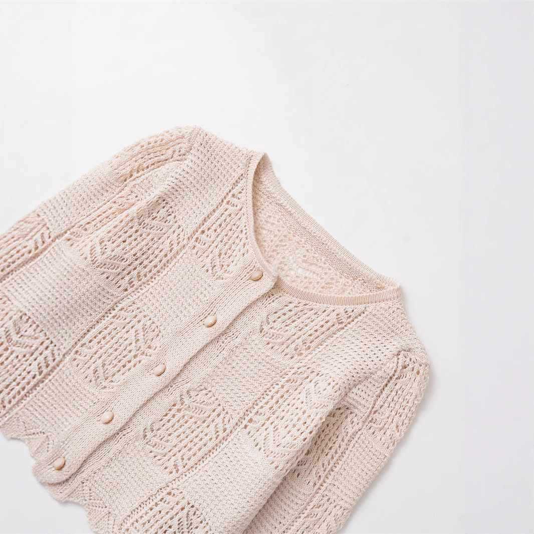 Dames cardigan en tricot confortable avec des boutons décoratifs et un design à volants tendance Chic und Stil