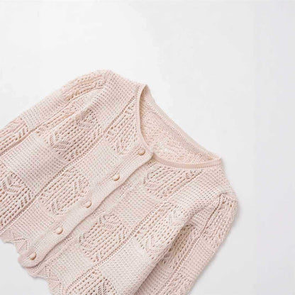 Dames cardigan en tricot confortable avec des boutons décoratifs et un design à volants tendance Chic und Stil