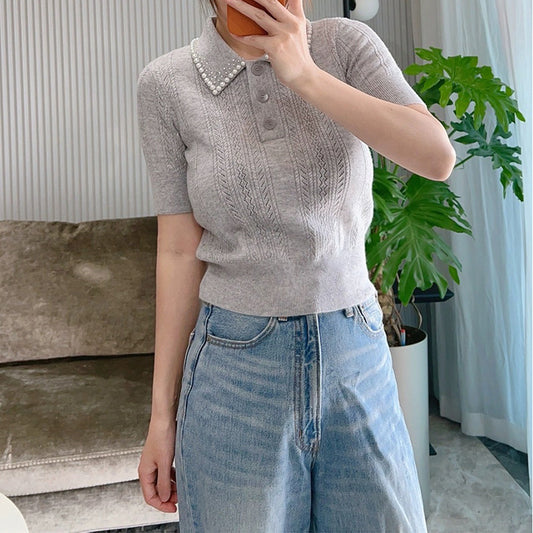 Top polo en tricot texturé pour femme avec détail en perles Chic und Stil