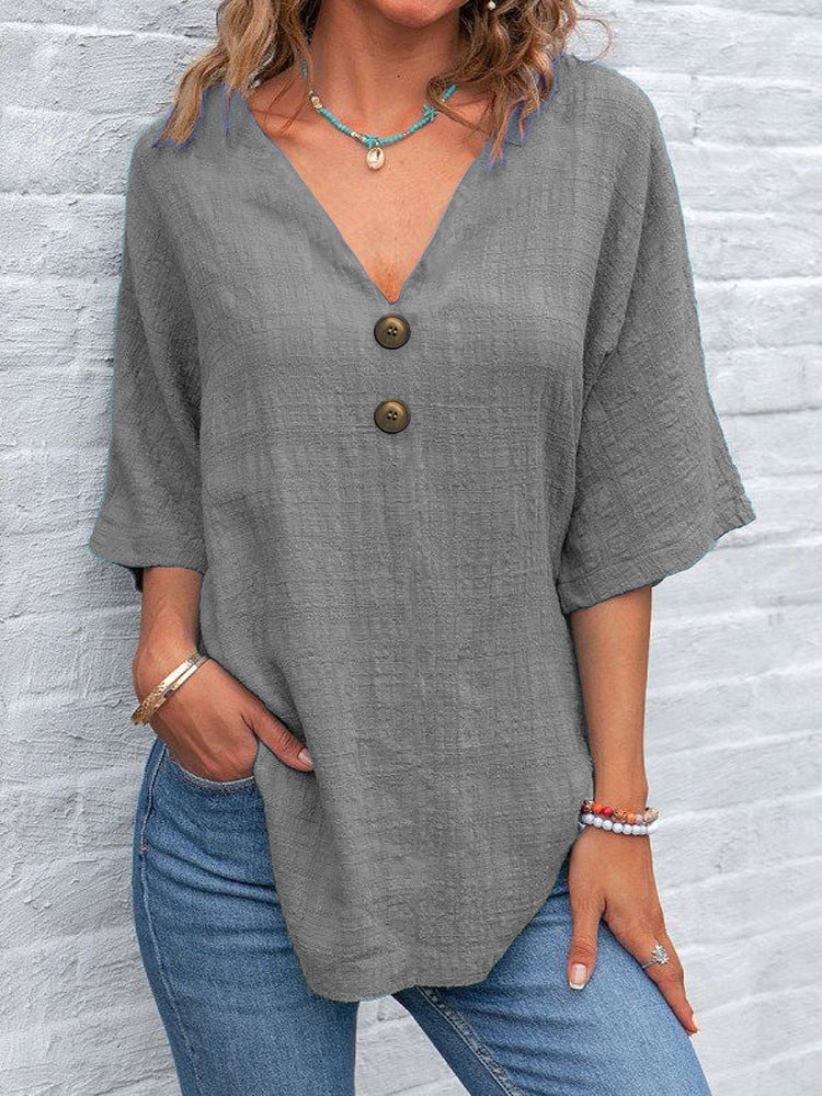 Blouse dames à col en V avec boutons décoratifs et coupe décontractée Chic und Stil