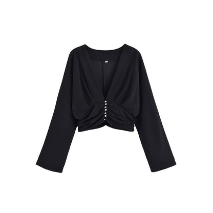 Dames haut élégant avec décolleté en V profond et design de ruché raffiné Chic und Stil