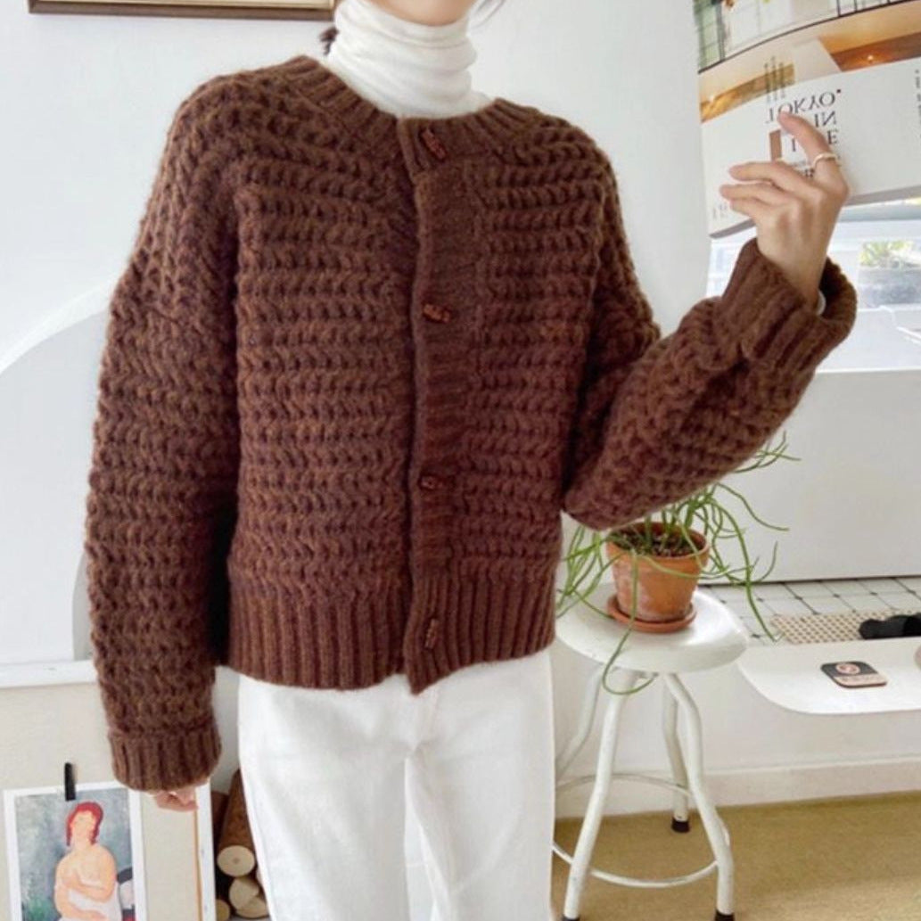Pull en gros tricot pour femmes avec patte de boutonnage décorative et motif en nid d'abeille Chic und Stil