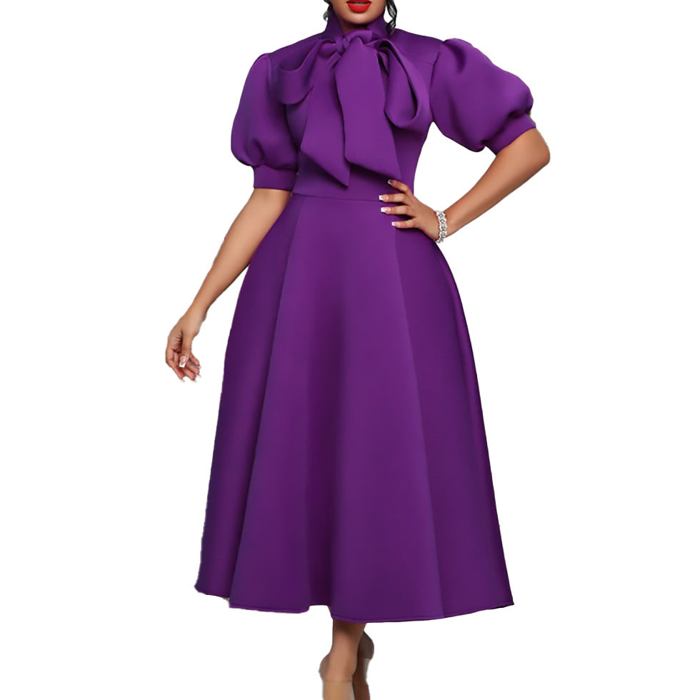 Robe maxi élégante pour femme avec des manches bouffantes volumineuses et un col à nœud Chic und Stil