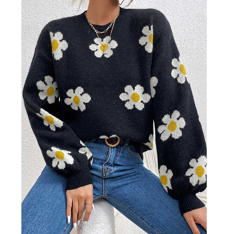 Pull femme avec motif floral et manches volumineuses Chic und Stil
