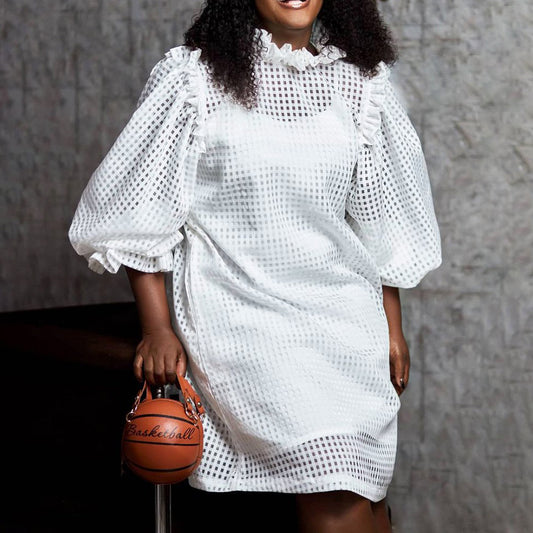 Robe transparente pour femmes avec des manches bouffantes volumineuses et un motif check Chic und Stil