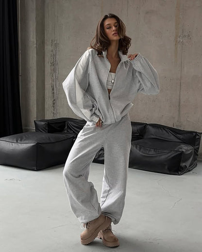 Women's sporty outfit with trendy zipper and wide pants Chic and Style