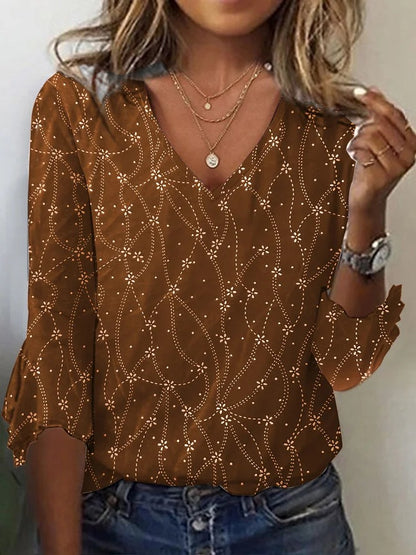 Blouse femme à col V avec un motif floral romantique et des manches volantées Chic und Stil