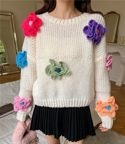 Femme Pull en tricot ludique avec des applications florales Chic und Stil
