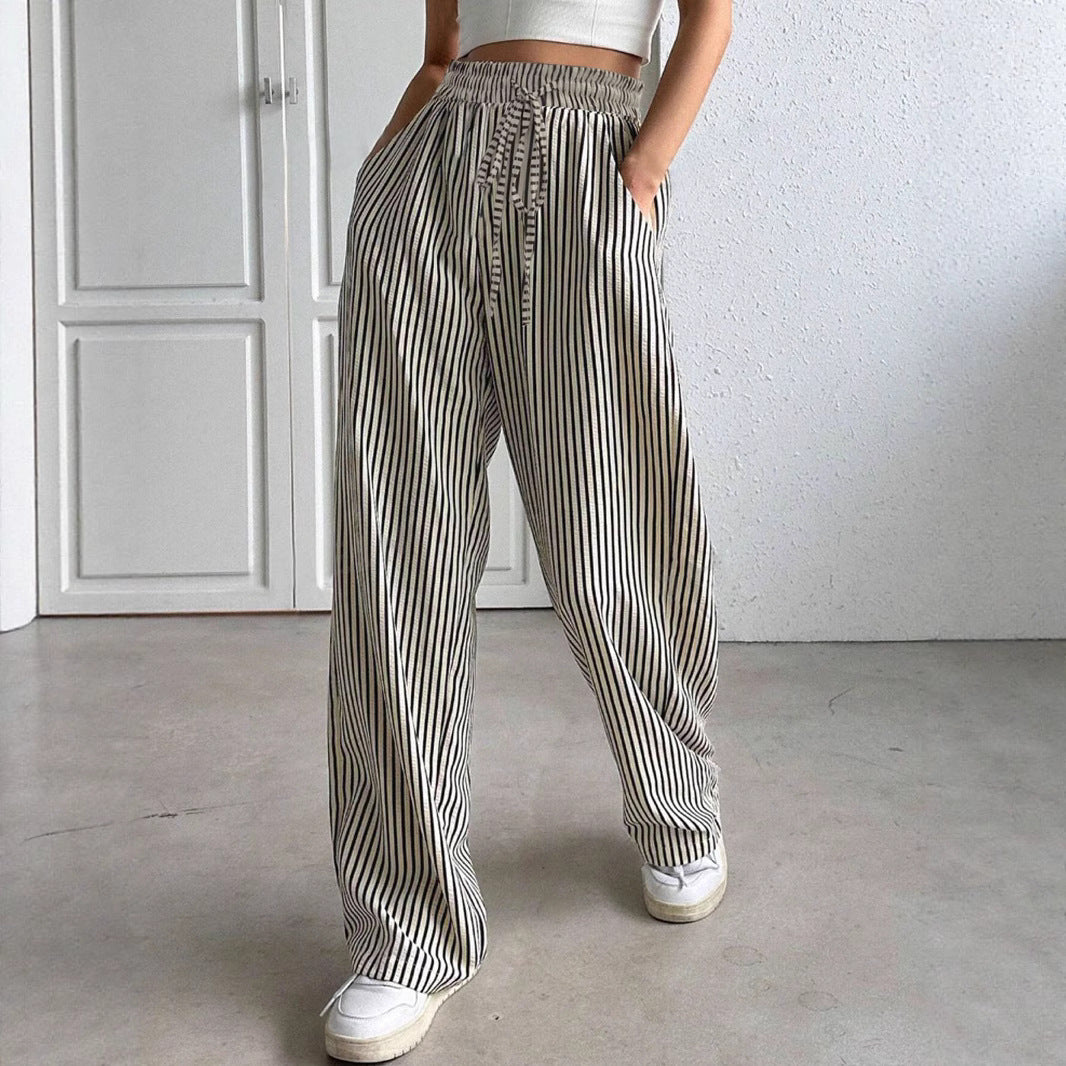 Striped wide pants for women with elastic waist and practical pockets Chic and Style