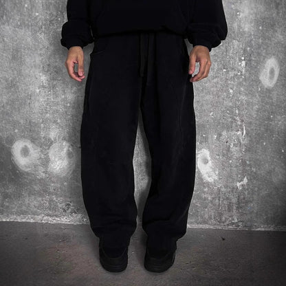 Pantalons en tissu décontractés pour femmes avec taille élastique et poches latérales volumineuses Chic & Stil