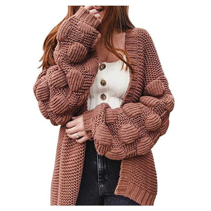 Veste en tricot pour femmes avec des manches bouffantes volumineuses et un aspect de maille structuré Chic und Stil