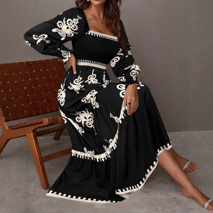 Femme Robe maxi élégante avec coupe à manches bouffantes et détails floraux Chic und Stil