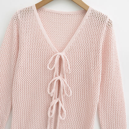 Pull en maille pour femmes avec décolleté en V et lacets Chic und Stil