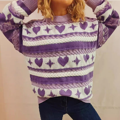 Pull en gros tricot pour femmes avec un motif de cœur ludique et des détails en torsades Chic und Stil
