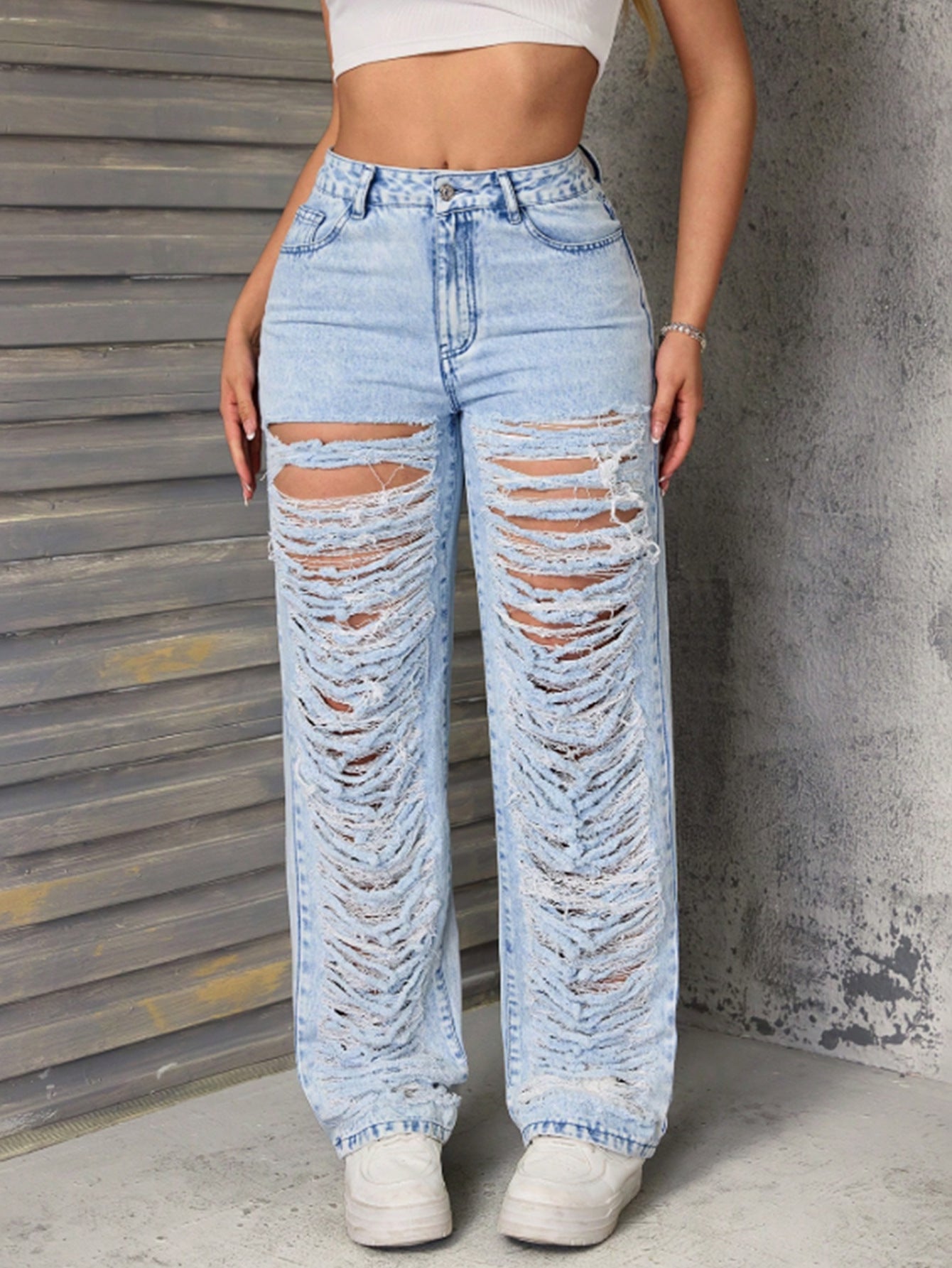 Jeans larges déchirés pour femmes avec des détails de déchirure frappants Chic und Stil