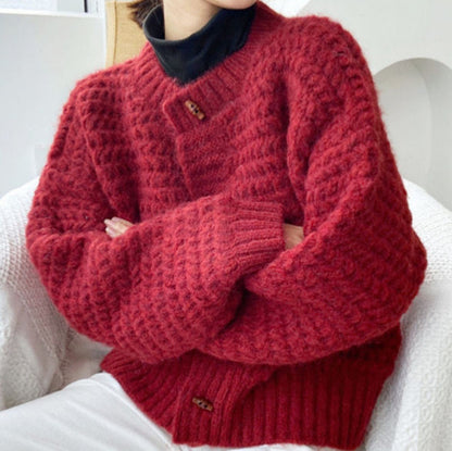Pull en gros tricot pour femmes avec patte de boutonnage décorative et motif en nid d'abeille Chic und Stil