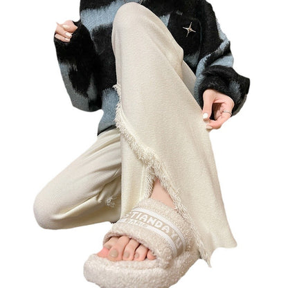 Ladies Elegant Pants with High Side Slits and Chic Fringed Finishes and Style