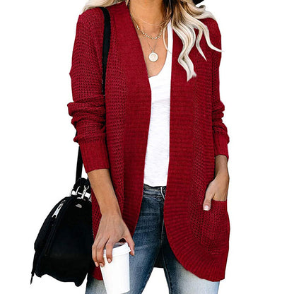 Veste en tricot pour femmes avec un motif de tricot moderne et des poches pratiques Chic und Stil