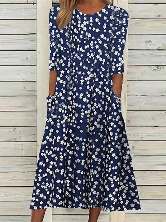 Robe midi élégante pour dames avec design floral et poches Chic und Stil