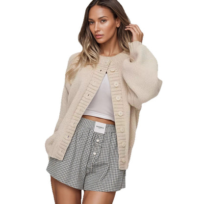 Dames Gilet en tricot à la mode avec manches bouffantes et détails de boutons Chic und Stil