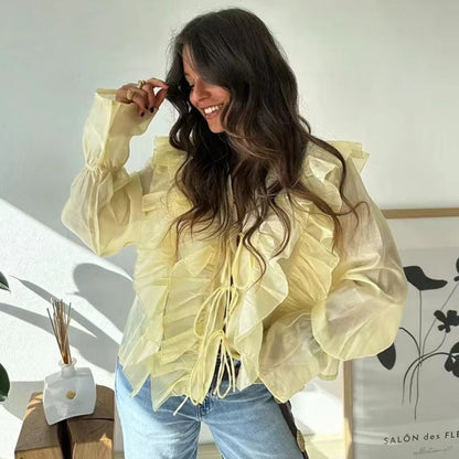 Chemisier à volants pour femmes avec des manches volumineuses et ludiques et un lien sur le côté Chic und Stil
