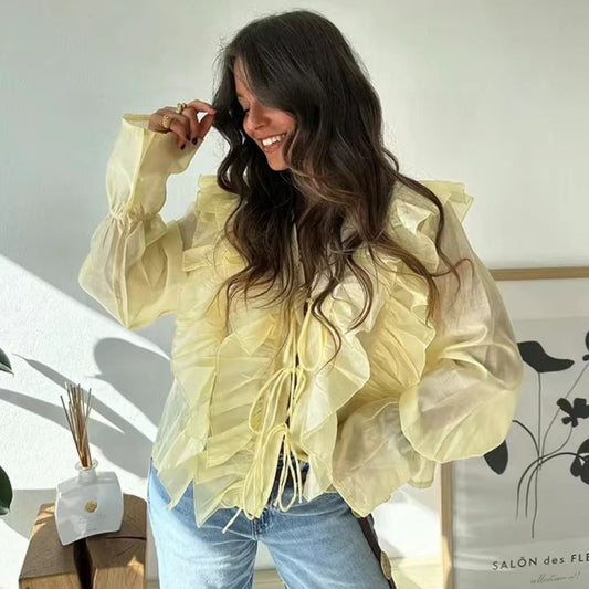 Chemisier à volants pour femmes avec des manches volumineuses et ludiques et un lien sur le côté Chic und Stil