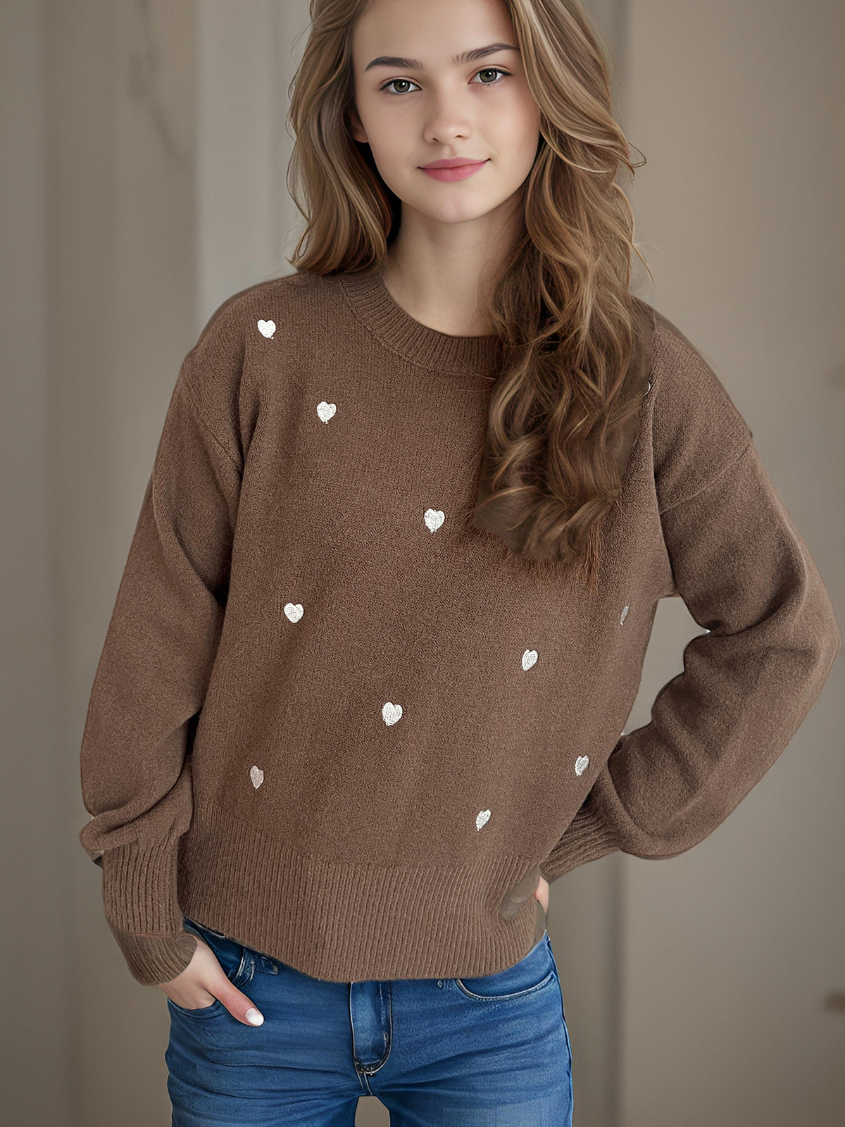 Pull femme avec un design de cœur ludique Chic und Stil
