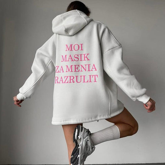 Pull à capuche urbain pour dames avec inscription ludique Chic und Stil