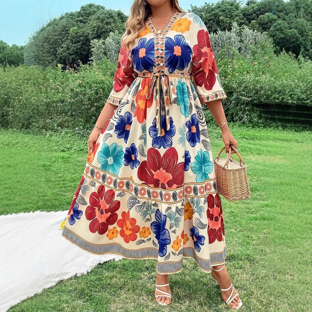 Robe maxi femme avec design floral coloré et ceinture à la taille Chic und Stil