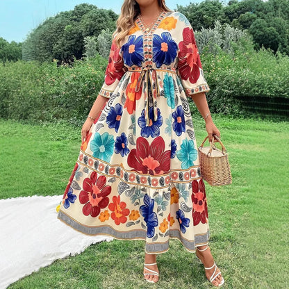 Robe maxi femme avec design floral coloré et ceinture à la taille Chic und Stil