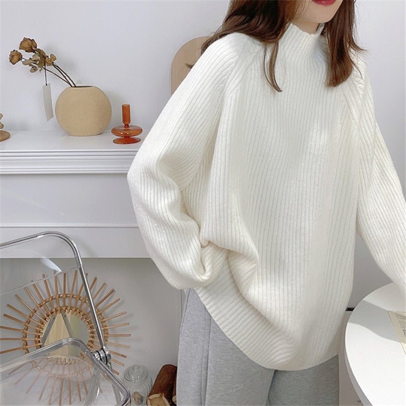 Pull femme décontracté en tricot épais avec col montant et ourlet asymétrique Chic und Stil