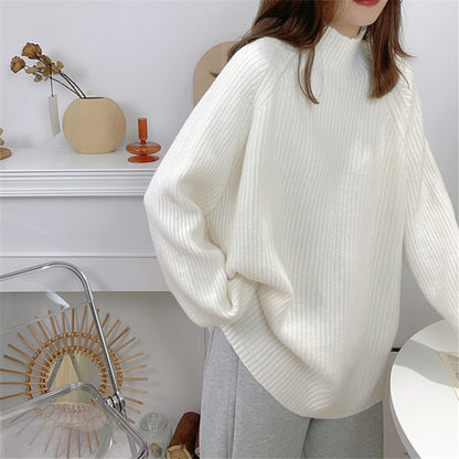 Pull femme décontracté en tricot épais avec col montant et ourlet asymétrique Chic und Stil