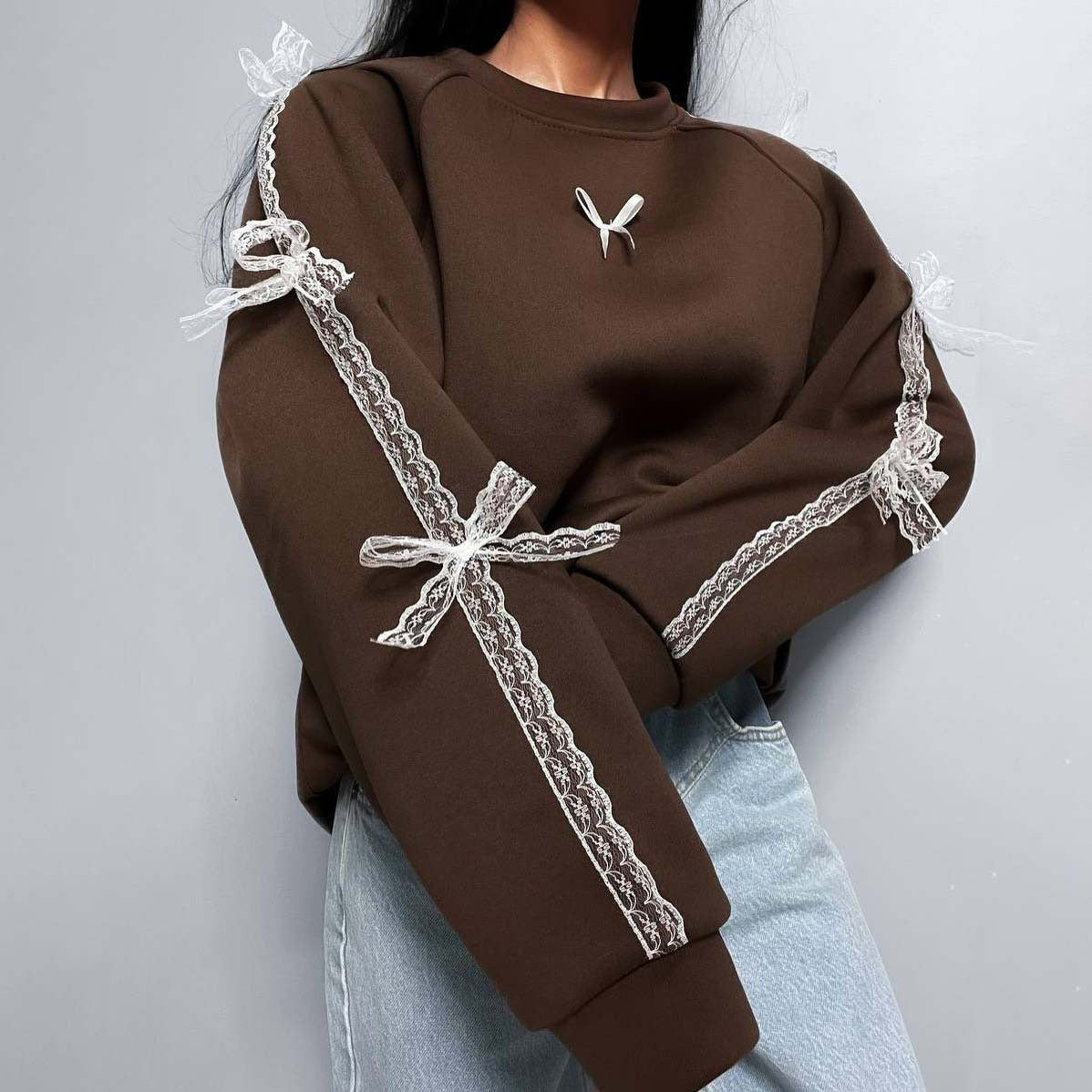 Dames élégant sweat-shirt avec des ceintures de lien uniques Chic und Stil