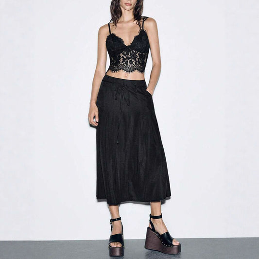 Loose jersey pants for women with a tie belt and practical pockets Chic and Style