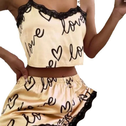Chic and Style women's satin crop top and shorts set with hearts and lace accents