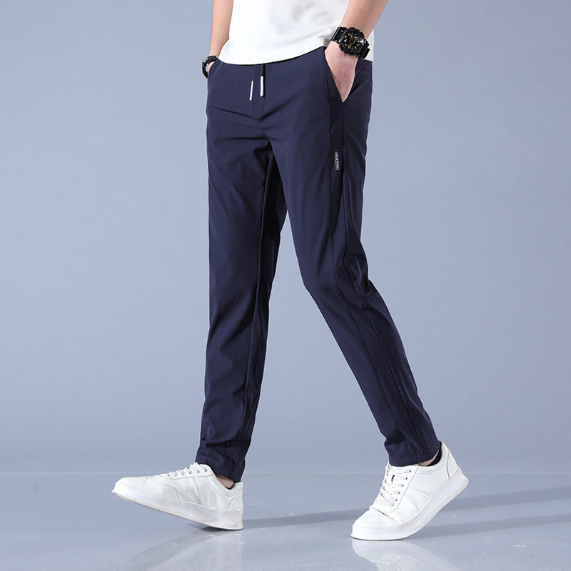 Men's sports pants with adjustable drawstring and zippered pockets on the sides Chic and Style
