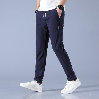 Men's sports pants with adjustable drawstring and zippered pockets on the sides Chic and Style