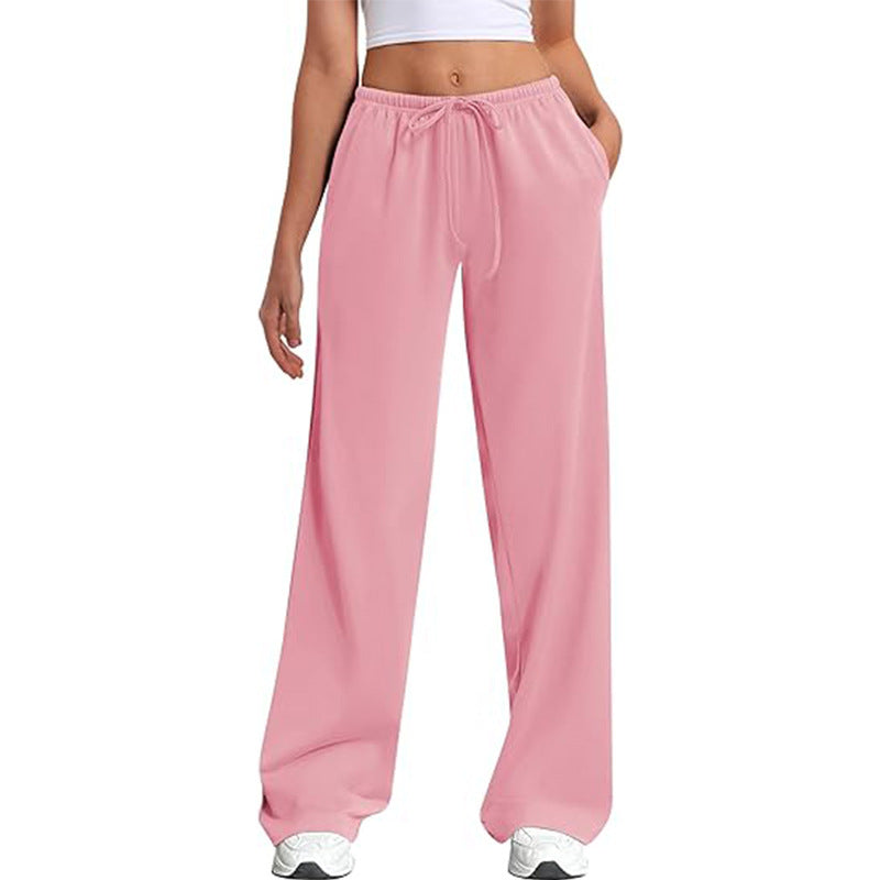 Loose sports pants for women with elastic waistband and side pockets Chic und Stil