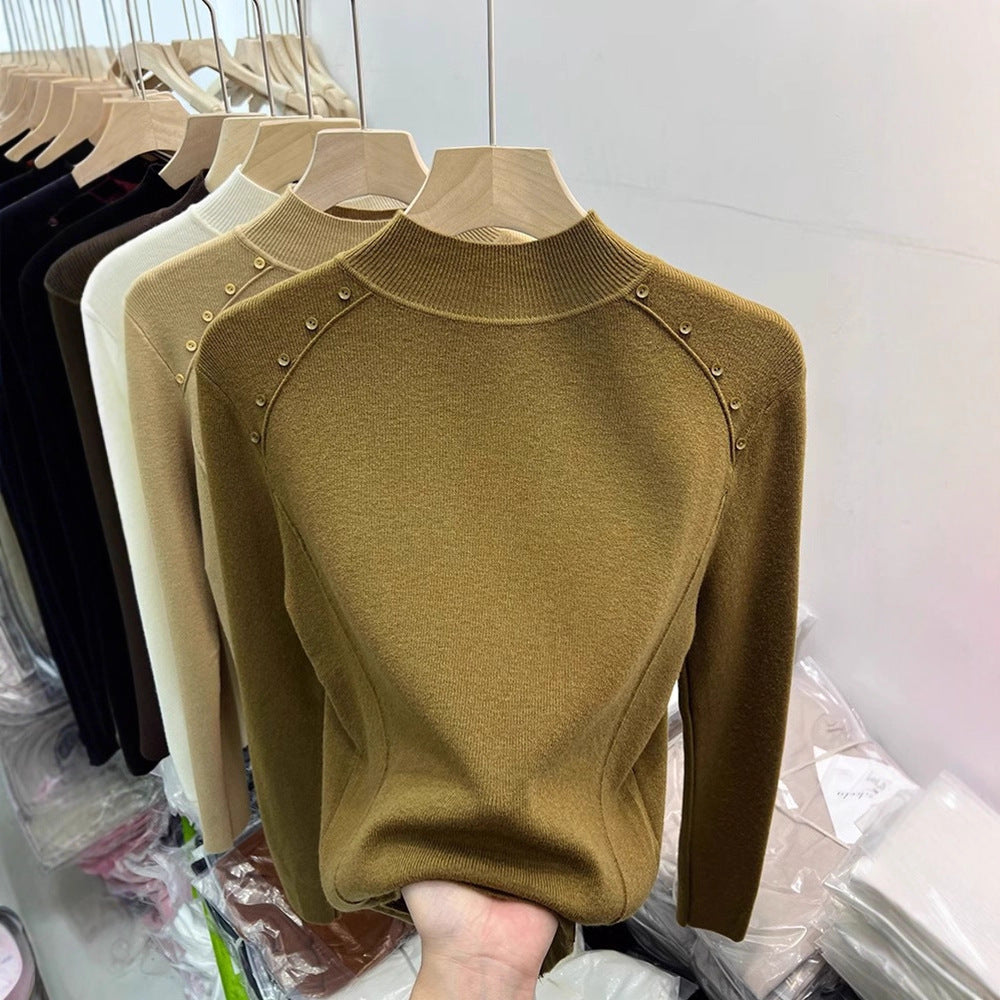 Pull élégant pour femmes avec détails de boutons et col haut Chic und Stil